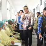 Salurkan Bantuan Rp582 Juta, Pemkab Kapuas dan Kemensos Gelar Bakti Sosial serta Penyerahan ATENSI